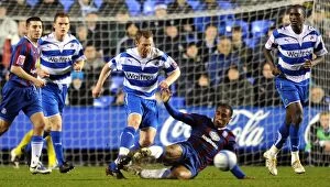 Images Dated 8th December 2009: Brynjar Gunnarsson vs Neil Danns: Intense Tackle in Reading vs Crystal Palace Championship Clash