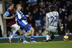 Images Dated 12th January 2008: Clash of the Football Giants: Aston Villa vs. Reading, FA Barclays Premiership (2008)