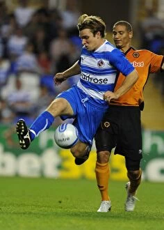 Images Dated 27th July 2010: A Clash of Midfield Maestros: Jay Tabb vs. Adlene Guedioura - Reading FC vs