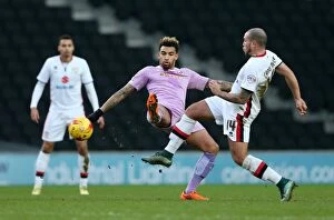 Images Dated 16th January 2016: Clash of the Midfielders: Carruthers vs. Williams at Stadium MK - MK Dons vs. Reading