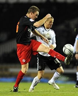 Images Dated 18th December 2010: A Clash of Pride Park Rivals: Cywka vs. Pearce