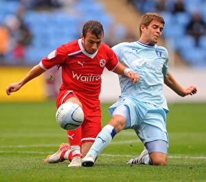Images Dated 24th September 2011: Clash at Ricoh Arena: A Battle Between Adam Le Fondre and Martin Cranie
