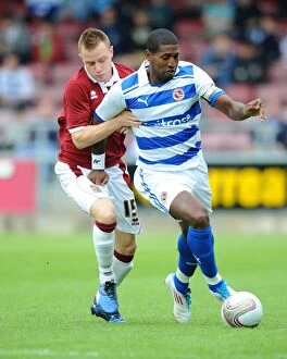 Images Dated 23rd July 2011: Clash at Sixfields: Turnbull vs. Leigertwood - Reading FC vs. Northampton Town Pre-Season Friendly