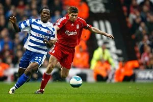 Images Dated 15th March 2008: Clash of Titans: Andre Bikey vs. Steven Gerrard, Liverpool vs. Reading, Barclays Premiership 2007/08