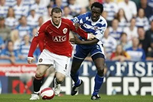 Images Dated 23rd September 2006: Clash of the Titans: Rooney vs Sonko - Reading FC vs Manchester United, September 23, 2006