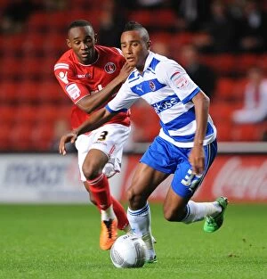 Images Dated 23rd August 2011: Clash at The Valley: Evina vs. Obita - Carling Cup First Round Battle between Charlton Athletic