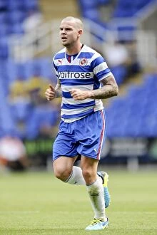 Pre-Season Friendly : Reading v Swansea City Collection: Danny Guthrie in Action: Reading FC vs Swansea City - Pre-Season Friendly at Madejski Stadium