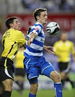 Images Dated 11th August 2009: David Mooney vs. Andy Corbett: A Riveting Clash in the Carling Cup between Reading
