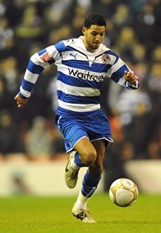 Images Dated 13th January 2010: Determined Jobi McAnuff at Anfield: Reading's Unwavering Warrior in the FA Cup Battle