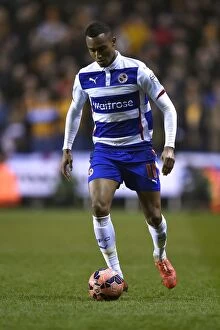 Images Dated 16th March 2015: Determined Jordan Obita in FA Cup Quarter Final Replay: Reading FC vs Bradford City at Madejski