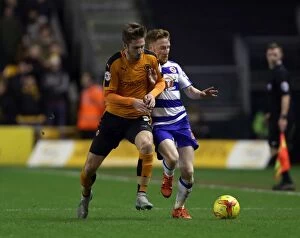 Wolves v Reading Collection: Doherty vs. Quinn: A Championship Showdown - Intense Battle for Ball Supremacy (Wolves vs. Reading)