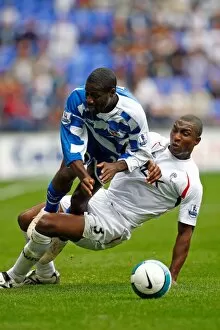 Images Dated 25th August 2007: Emerse Fae is brought down by Jlloyd Samuel