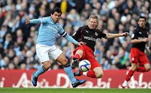 Images Dated 14th March 2011: FA Cup Sixth Round Clash: Tevez vs. Gunnarsson at Manchester City Stadium