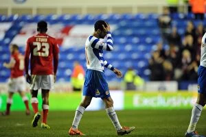 Images Dated 25th March 2014: A Fierce Championship Clash: Reading FC vs Barnsley (2013-14 Season), Sky Bet Championship