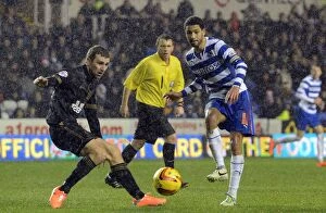 Images Dated 21st December 2013: A Fierce Sky Bet Championship Clash: Reading FC vs Wigan Athletic (2013-14)