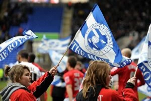 Images Dated 13th February 2010: Fifth Round FA Cup Showdown: Reading vs. West Bromwich Albion - A Sea of Reading Flags