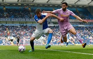 Images Dated 7th May 2016: Grant Hanley Stands Firm Against Hal Robson-Kanu: Reading vs