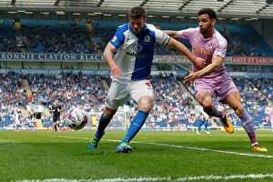 Images Dated 7th May 2016: Grant Hanley vs. Hal Robson-Kanu: A Battle for Supremacy in Reading vs