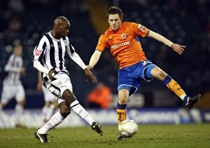 Images Dated 24th February 2010: Gylfi Sigurdsson vs Youssouf Mulumbu: A Battle at The Hawthorns - FA Cup Fifth Round Replay