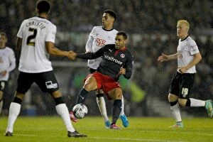 Images Dated 23rd September 2014: Hal Robson-Kanu Surrounded by Derby County Defenders in Intense Capital One Cup Clash at iPro