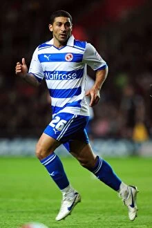 Images Dated 13th April 2012: Hayden Mullins Leads Reading in Npower Championship Showdown Against Southampton