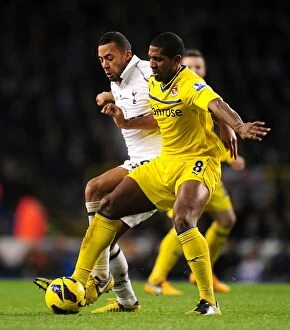 Images Dated 1st January 2013: Intense Battle for the Ball: Moussa Dembele vs. Mikele Leigertwood (Premier League)