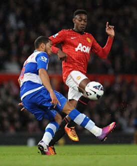 Manchester United v Reading : Old Trafford : 16-03-2013 Collection: Intense Battle for the Ball: Welbeck vs. Mariappa - Manchester United vs