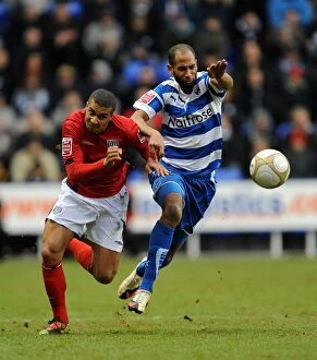 Images Dated 13th February 2010: Intense Battle: Jimmy Kebe vs. Gianni Zuiverloon - Reading's FA Cup Fifth Round Clash