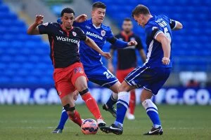Images Dated 24th January 2015: Intense Battle: Nick Blackman vs. Ben Turner - FA Cup Match between Cardiff City and Reading
