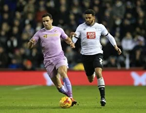 Derby County v Reading Collection: Intense Battle for Supremacy: Cyrus Christie vs. Hal Robson-Kanu at iPro Stadium