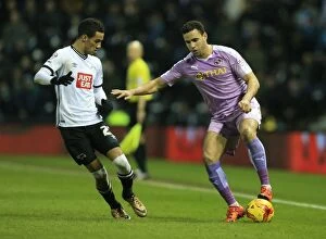 Derby County v Reading Collection: Intense Battle for Supremacy: Tom Ince vs. Hal Robson-Kanu at iPro Stadium