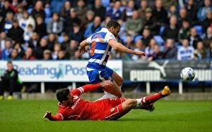 Reading v Cardiff City Collection: Intense Championship Clash: Hal Robson-Kanu vs. Sean Morrison - A Hard-Fought Tackle at Reading's