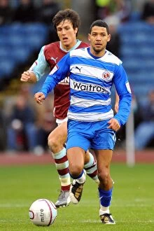 Images Dated 23rd October 2010: Intense Championship Showdown: McAnuff vs Cork at Burnley's Turf Moor
