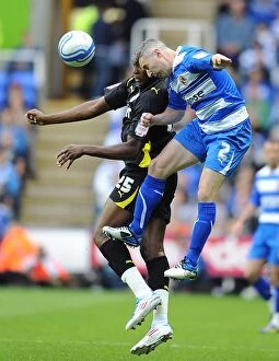 Images Dated 13th May 2011: Intense Clash: Griffin vs Emmanuel-Thomas in Reading's Championship Play-Off Semi-Final Against