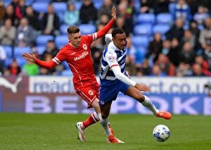Reading v Cardiff City Collection: Intense Clash: Jordan Obita vs. Craig Noone - A Hard-Fought Tackle in the Sky Bet Championship