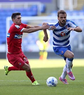 Images Dated 1st August 2015: Intense Clash: Orlando Sa vs. Javier Lopez in Reading vs. Espanyol Football Match