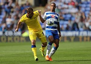 Images Dated 16th August 2015: Intense Rivalry: Chris Wood vs. Anton Ferdinand Clash in Sky Bet Championship Match between