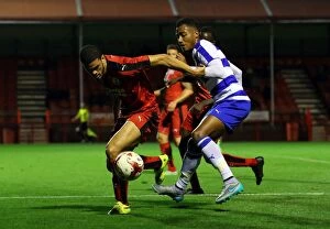 Images Dated 27th July 2015: Intense Rivalry: Fenelon vs. Obita Clash in Crawley Town's Pre-Season Encounter with Reading