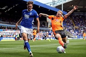 Birmingham City v Reading Collection: Intense Rivalry: Gallagher vs. McShane - A Battle for the Ball