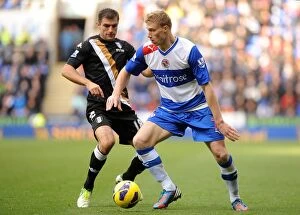 Images Dated 27th October 2012: Intense Rivalry: Pogrebnyak vs. Hughes - Reading FC vs. Fulham's Battle for Supremacy in