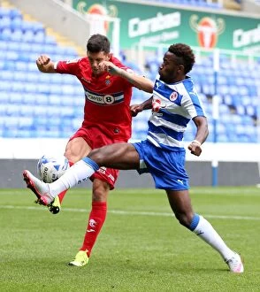 Images Dated 1st August 2015: Intense Rivalry: Tariqe Fosu vs. Javier Lopez at the Reading vs. Espanyol Match