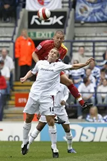 Images Dated 23rd April 2007: Ivar Ingimarsson out jumps Boltons Kevin Davies
