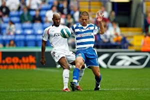 Images Dated 25th August 2007: Ivar Ingimarsson wins the ball ahead of Nicolas Anelka