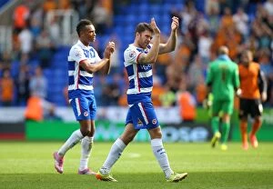 Images Dated 28th September 2014: Jamie Mackie's Euphoric Moment: Reading FC's Championship Victory over Wolverhampton Wanderers