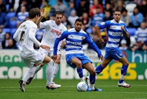 Images Dated 16th October 2010: Jobi McAnuff vs Orlandi and Rangel: A Fierce Face-Off Between Reading FC and Swansea City