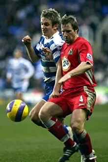 Images Dated 17th December 2006: Kevin Doyle challenges Blackburns Andy Todd