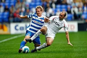 Images Dated 25th August 2007: Kevin Doyle gets in a cross under pressure from Gavin McCann