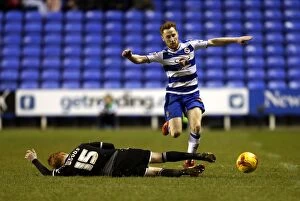 Images Dated 28th December 2015: Leaping Quinn: An Intense Moment of Football Action - Reading's Stephen Quinn Jumps Over