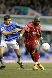 Images Dated 29th January 2007: Leroy Lita prepares to shoot under a challenge from Matthew Upson