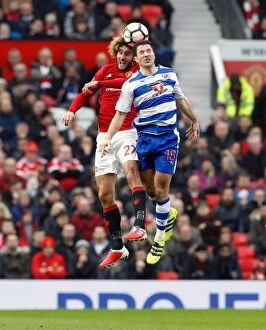 Images Dated 7th January 2017: Manchester United vs. Reading: Fellaini vs. Kermorgant - Aerial Battle in the Emirates FA Cup